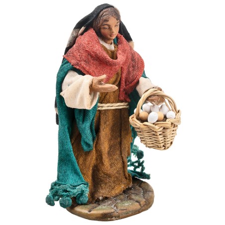 Mujer con cesta 9-10 cm en terracota con ropa de tela para