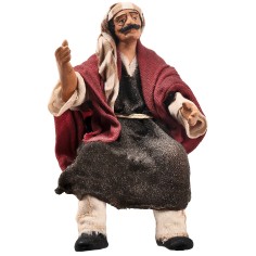 Seated farmer 15 cm series in terracotta with fabric clothes