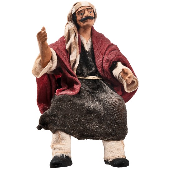 Seated farmer 15 cm series in terracotta with fabric clothes
