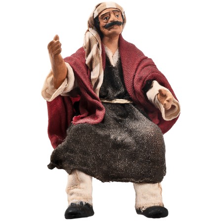 Campesino sentado serie 15 cm en terracota con ropa de tela