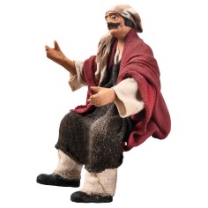 Seated farmer 15 cm series in terracotta with fabric clothes 2
