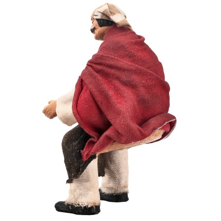 Campesino sentado serie 15 cm en terracota con ropa de tela