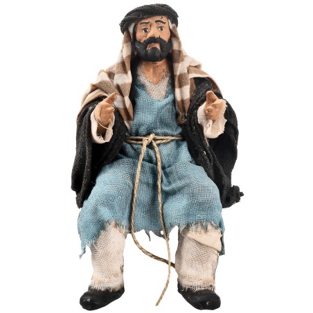 Seated man series 15 cm in terracotta with fabric clothes for