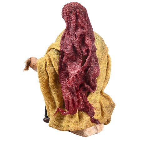 Seated woman series 9-10 cm in terracotta with fabric clothes