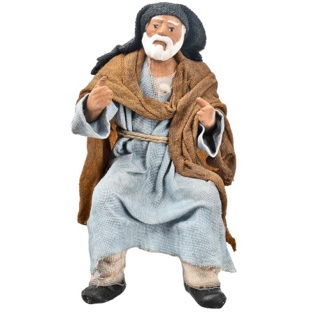 Seated Palestinian man 15 cm series in terracotta with fabric