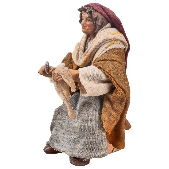 Seated woman with fabric 10 cm series in terracotta with fabric