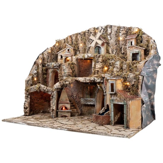 Handcrafted nativity scene with moving mill, stream, and oven