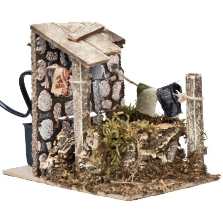 Fuente con chorro y bomba funcionando con corriente cm