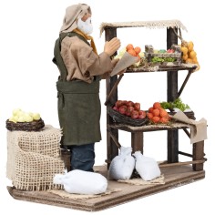 Fruttivendolo con banco h 17 cm in movimento per presepe Mondo 2