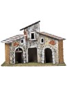 Tre case con archi in pietra e facciate invecchiate cm