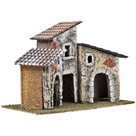 Three houses with stone arches and aged facades cm