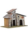 Tres casas con arcos de piedra y fachadas envejecidas cm