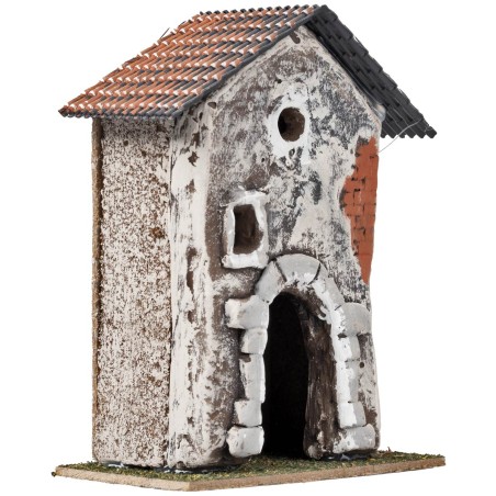 Tre case con archi in pietra e facciate invecchiate cm