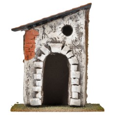 Casa con arco de piedra y techo inclinado cm 10,6x7,2x12,5 h