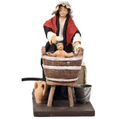Woman washing child in motion 14 cm for Mondo nativity scene