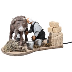 Contadino che munge in movimento serie 14 cm per presepe Mondo