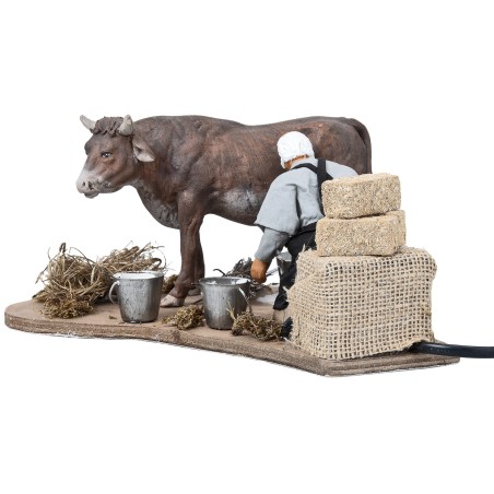 Contadino che munge in movimento serie 14 cm per presepe Mondo