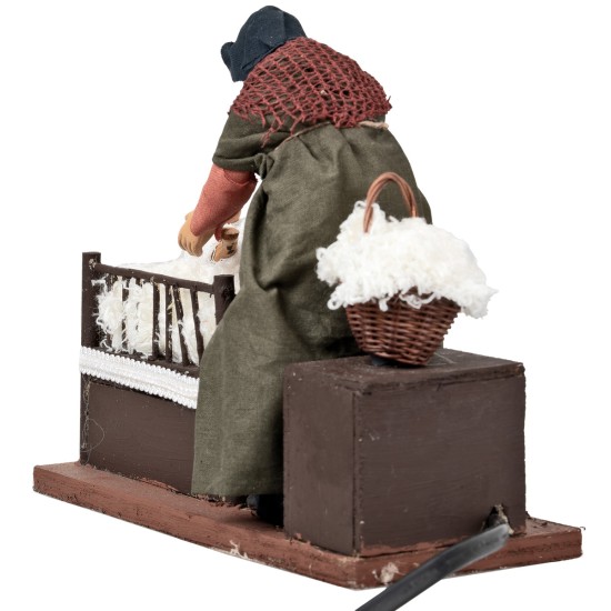 Mujer con niño en la cuna con doble movimiento serie 14 cm