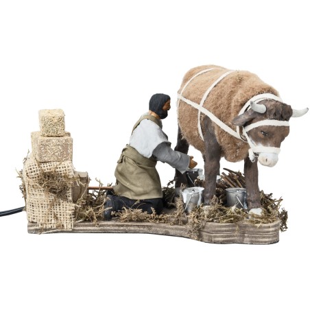 Farmer milking cow with double movement series 12 cm per