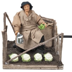 Farmer woman watering vegetables in motion series 12 cm