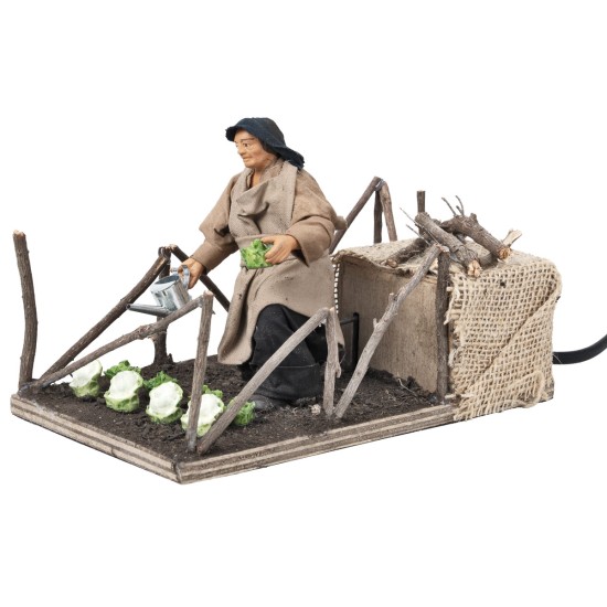 Campesina que cultiva hortalizas en movimiento serie 10 cm