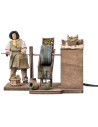 Woman grinding olives in motion series 12 cm for nativity scene
