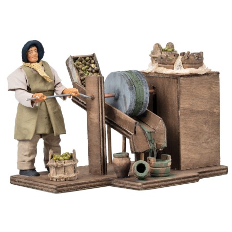 Donna che macina olive in movimento serie 12 cm per presepe