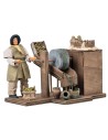 Woman grinding olives in motion series 12 cm for nativity scene