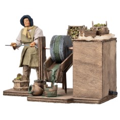 Woman grinding olives in motion series 12 cm for nativity scene 2