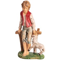 Boy sitting on fence with little sheep h 18 cm for nativity scene 2