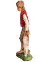 Boy sitting on fence with little sheep h 18 cm for nativity scene