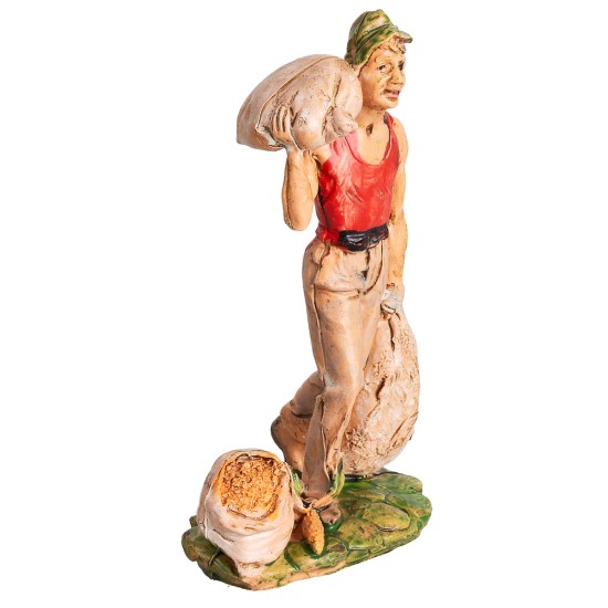 Uomo con tre sacchi h 10 cm per presepe Mondo Presepi
