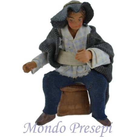 Cm 12 Man sitting on stool