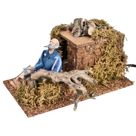 Boscaiolo che taglia albero 12 cm in movimento per presepe