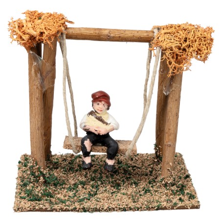 Child on the swing h 10 cm for nativity scene Mondo Presepi