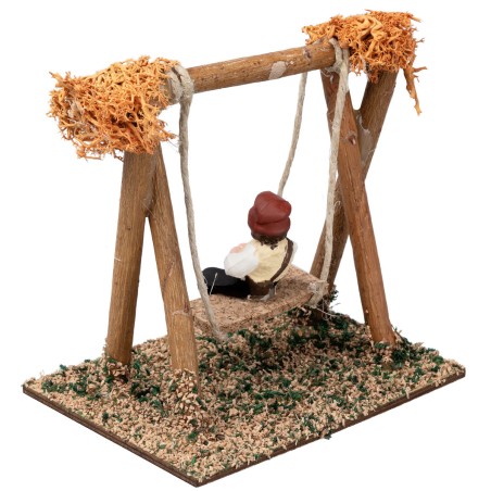 Bambino sull'altalena h 10 cm per presepe Mondo Presepi