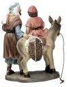 Padre con niño sobre el burro en resina 10 cm para belén Mundo