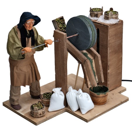 Hombre con molino de aceitunas serie 25 cm en movimiento