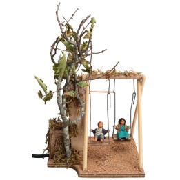 Due bimbi sull'altalena serie 10 cm con doppio movimento