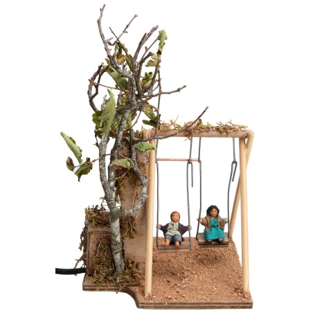 Dos niños en el columpio serie 10 cm con doble movimiento