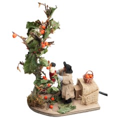 Man with child picking fruit, 10 cm series in motion 2