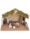 Hut with arched doorway complete with Landi Cost. 