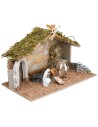 Hut with arched doorway complete with Landi Cost. 