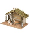 Hut with arched doorway complete with Landi Cost. 