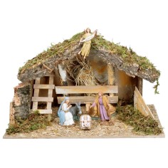 Cabaña con pesebre y escalera lateral completa de estatuas