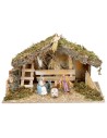 Cabaña con pesebre y escalera lateral completa con estatuas