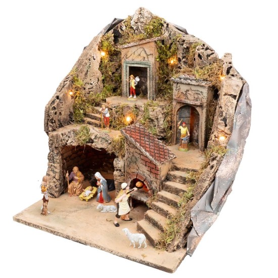 Illuminated nativity scene with working oven complete with statues
