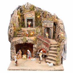 Illuminated nativity scene with working oven complete with statues