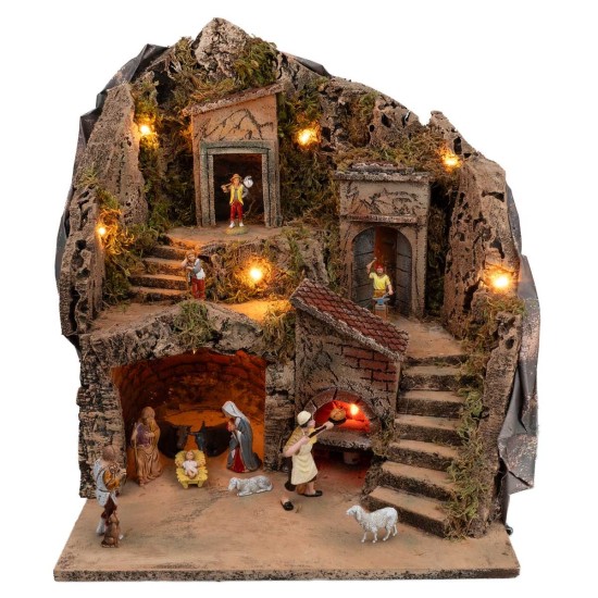 Illuminated nativity scene with working oven complete with statues