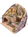 Presepe illuminato con fontana e asino alla macina in movimento